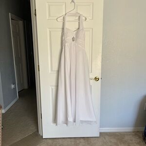 White bridal formal dress with beaded design, halter neck and zip back